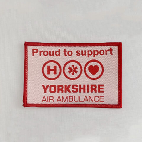 Sew on 'Proud to support....' fabric badge