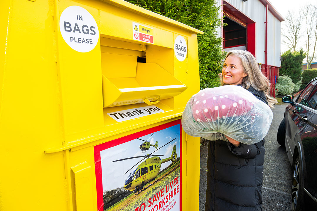 Woman at recycling centre